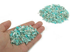 Amazonite crystal chips, semi-tumbled 2-6mm gemstones from GemstoneGO, showing vibrant blue-green mineral fragments.