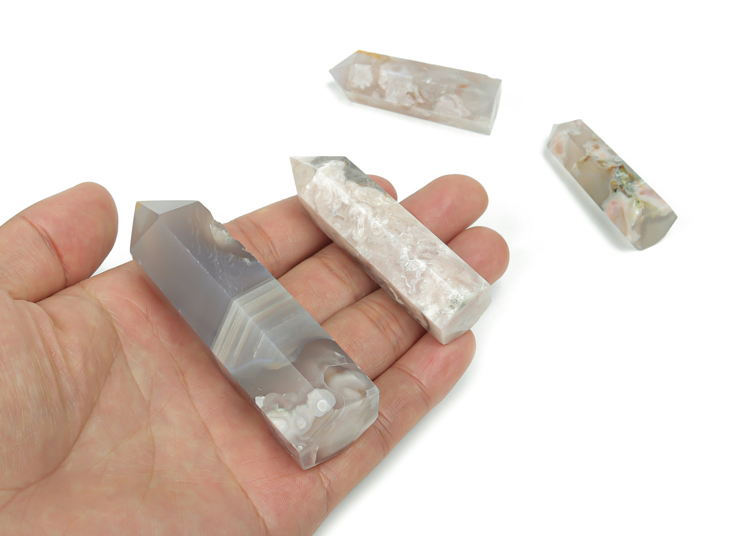 Flower Agate obelisk tower crystal with cherry blossom patterns from GemstoneGO, showcasing intricate natural stone details.