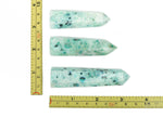 Phoenix Obelisk Tower crystal from GemstoneGO, featuring a vibrant, polished gemstone obelisk with intricate natural patterns.