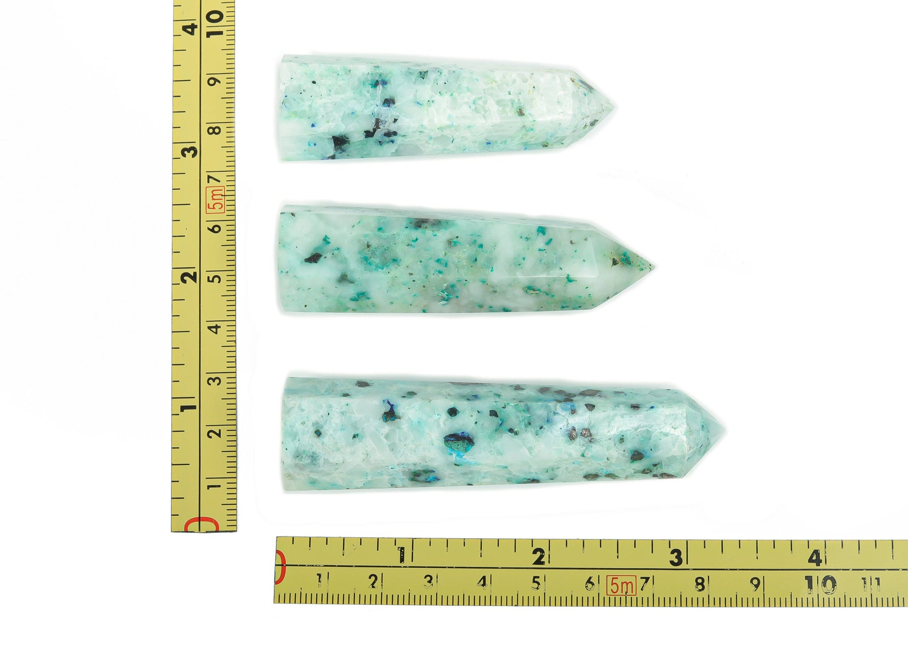 Phoenix Obelisk Tower crystal from GemstoneGO, featuring a vibrant, polished gemstone obelisk with intricate natural patterns.