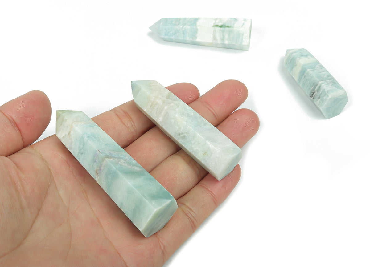 Sky blue Amazonite obelisk tower crystal from GemstoneGO, showcasing a polished gemstone with natural blue and green hues.