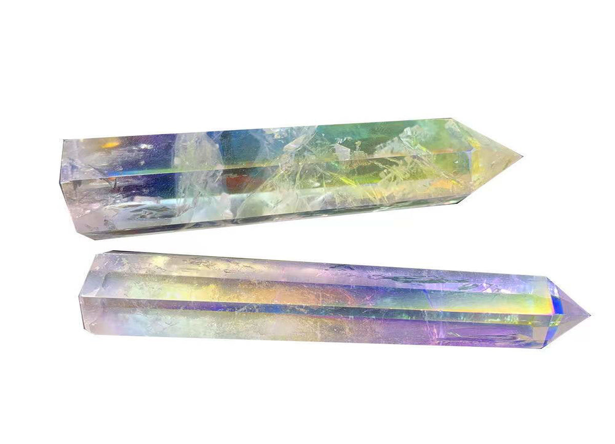 Angel Aura Quartz obelisk tower crystal from GemstoneGO showcasing a shimmering, iridescent gemstone with pointed tip and polished surface.