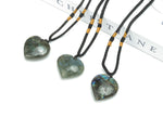 Labradorite heart-shaped crystal pendant on a silver chain, gemstone necklace by GemstoneGO, showcasing iridescent labradorite stone.
