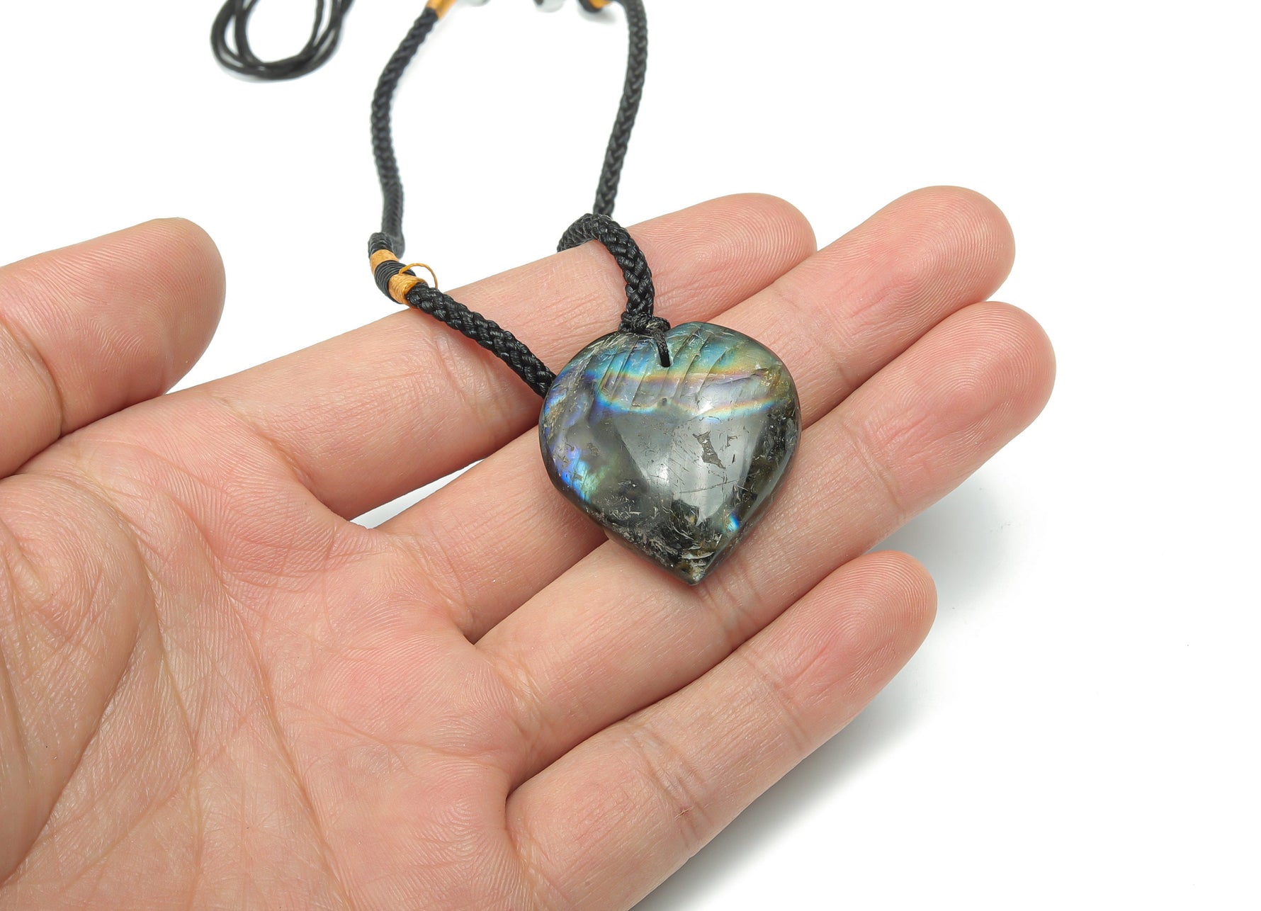 Labradorite heart-shaped crystal pendant necklace from GemstoneGO, featuring a polished Labradorite stone on a silver chain.