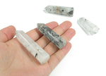 Tourmalinated Quartz obelisk tower crystal from GemstoneGO featuring black tourmaline inclusions in clear quartz.