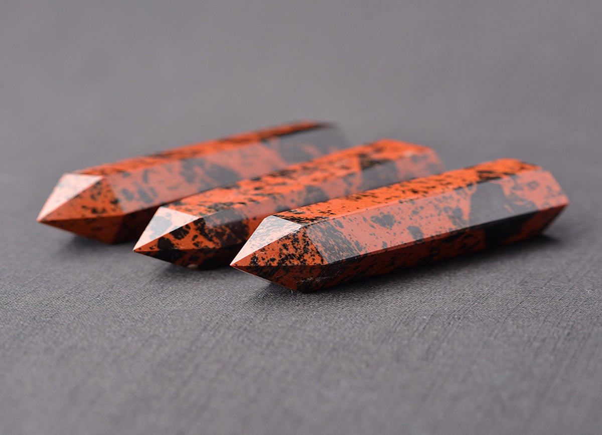 Mahogany Obsidian obelisk tower crystal with polished dark brown and black gemstone surface, decorative and energy-clearing stone.