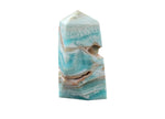 Blue Caribbean Calcite Druzy Obelisk Tower crystal from GemstoneGO, featuring a vibrant blue mineral with textured druzy surface.
