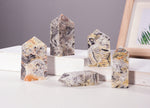Crazy Lace Agate obelisk tower crystal from GemstoneGO featuring vibrant, intricate patterns and polished pointed shape.