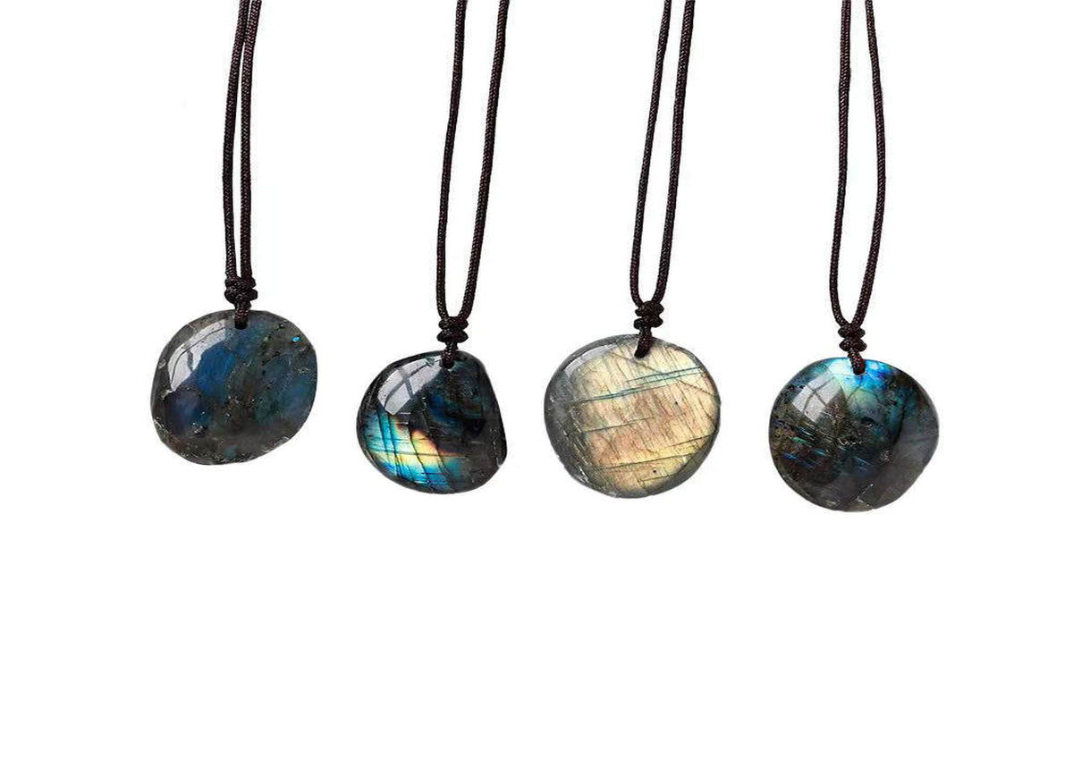 Labradorite crystal necklace on a cord, featuring polished gemstone pendant, ideal for gifts and jewelry accessories.