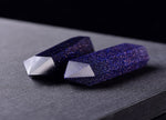 Blue Goldstone obelisk tower crystal from GemstoneGO with a polished, deep blue and gold flecked surface, standing upright.