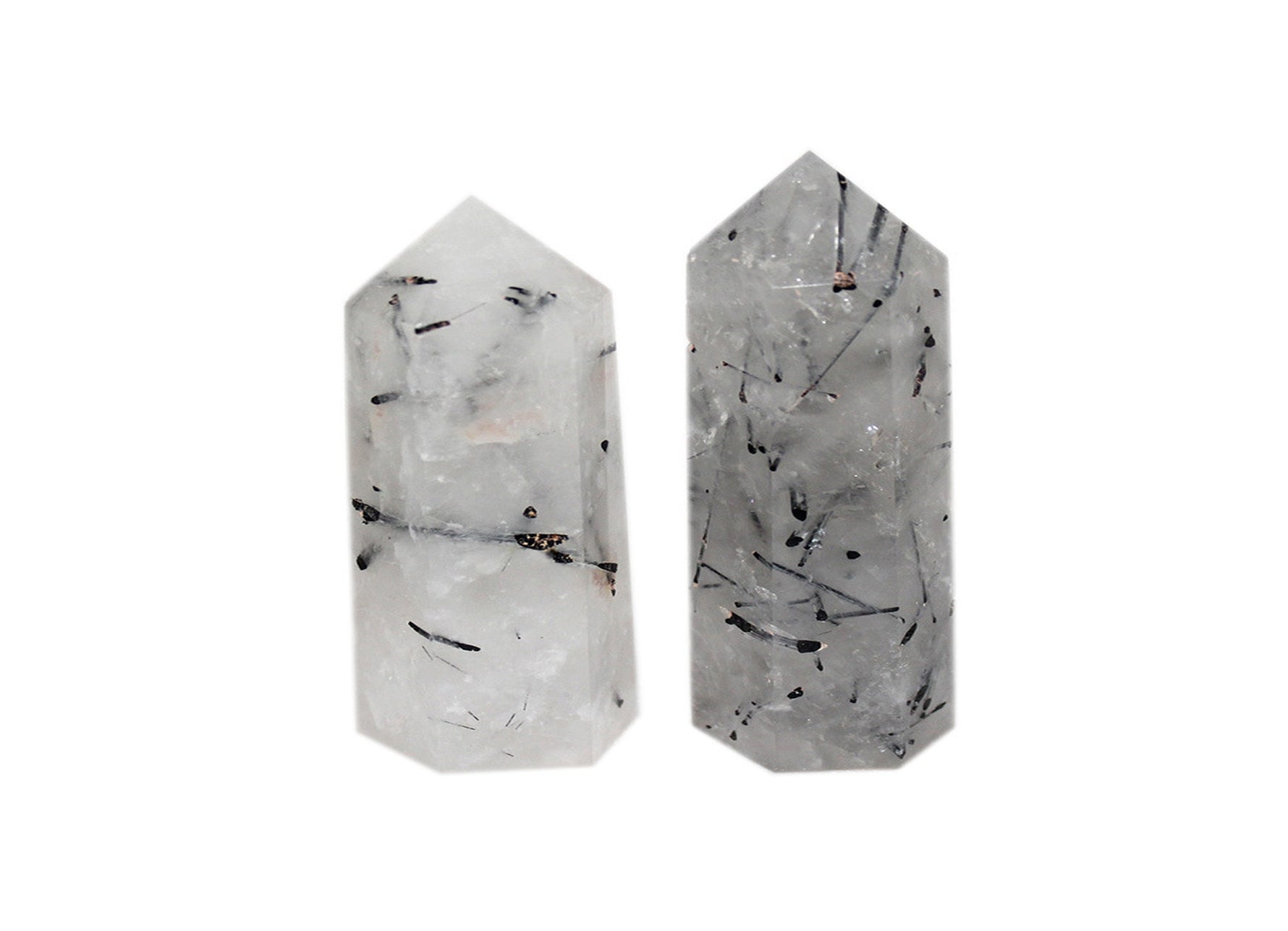 Tourmalinated Quartz obelisk tower crystal by GemstoneGO, featuring black tourmaline inclusions in clear quartz.
