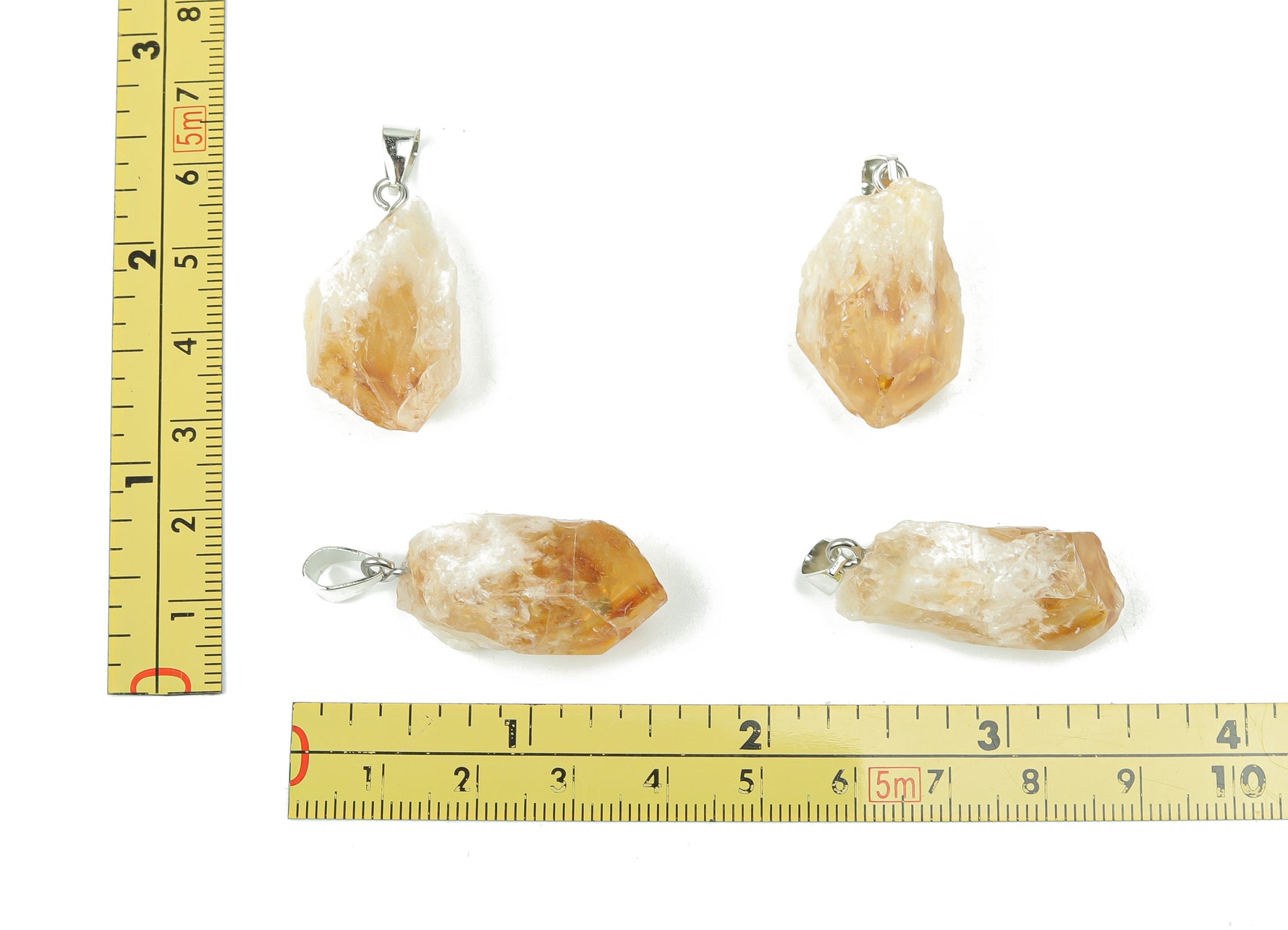 Citrine crystal pendant from GemstoneGO, showcasing a polished yellow-orange gemstone for jewelry making supplies.