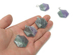 Fluorite star Merkaba crystal pendant from GemstoneGO, showcasing a colorful gemstone pendant for jewelry making supplies.
