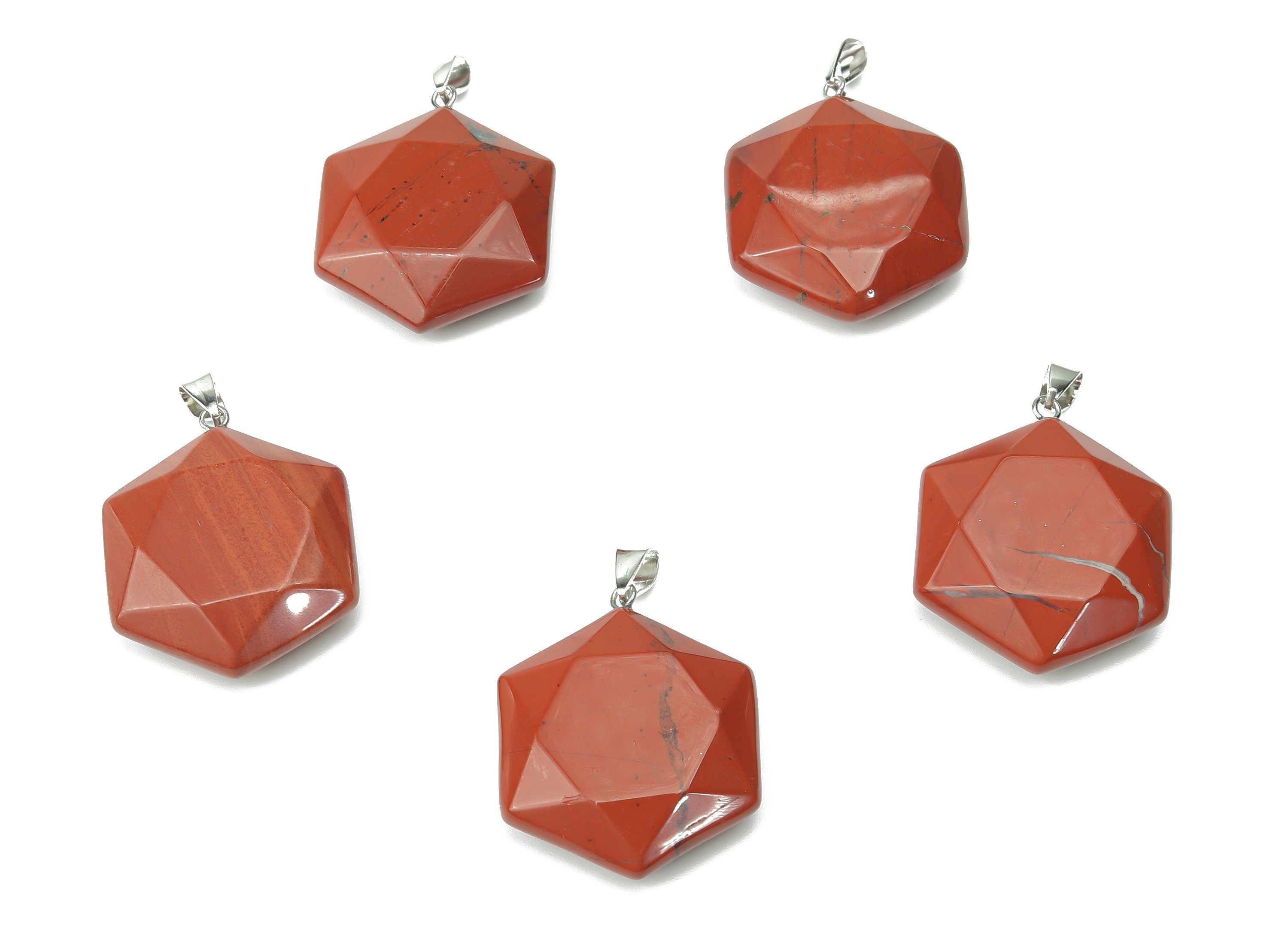 Red Jasper Star Merkaba crystal pendant from GemstoneGO, featuring a vibrant red jasper gemstone carved into a star-shaped Merkaba design.