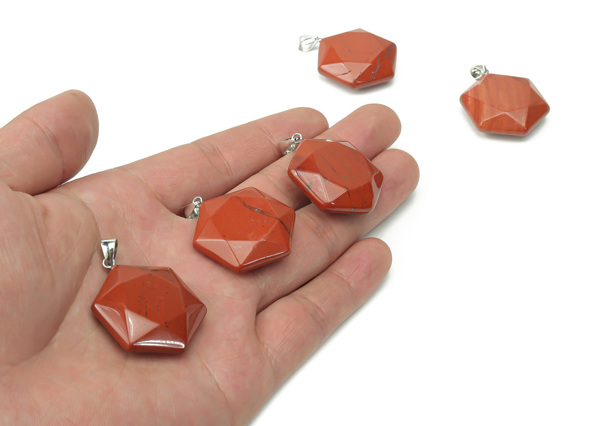 Red Jasper Star Merkaba crystal pendant from GemstoneGO, featuring a polished red jasper star-shaped pendant with a silver bail.