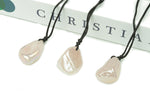 Angel Aura Quartz crystal necklace on cord, featuring iridescent gemstone jewelry by GemstoneGO.