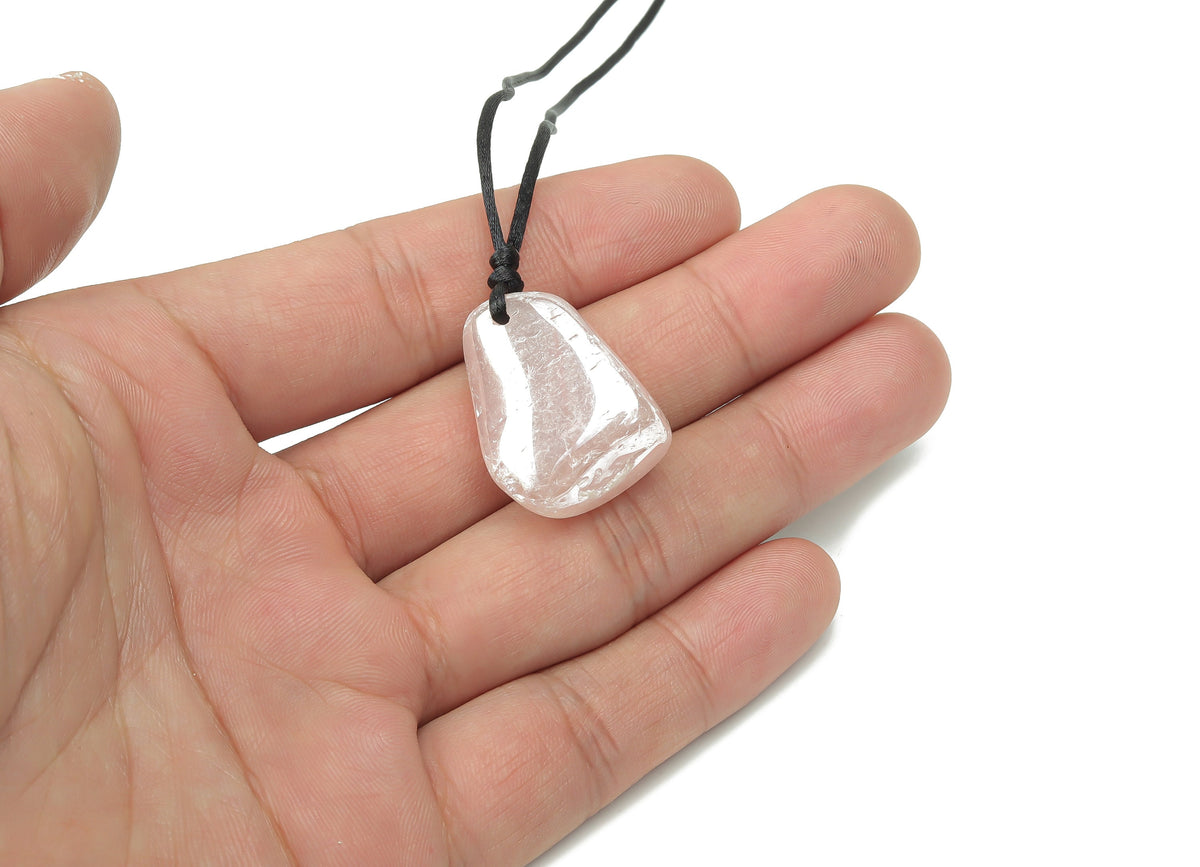 Angel Aura Quartz crystal necklace on cord, featuring a shimmering gemstone pendant, ideal for gifts or everyday wear.