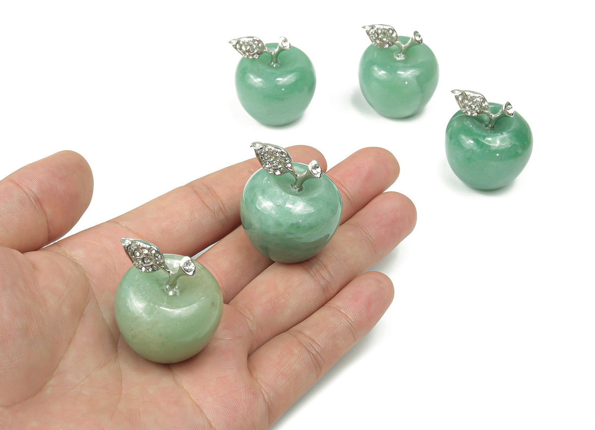 A 30mm aventurine apple-shaped crystal carving from GemstoneGO, showcasing smooth green gemstone with natural patterning.