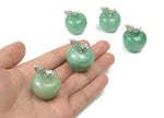 A 30mm aventurine apple-shaped crystal carving from GemstoneGO, showcasing smooth green gemstone with natural patterning.