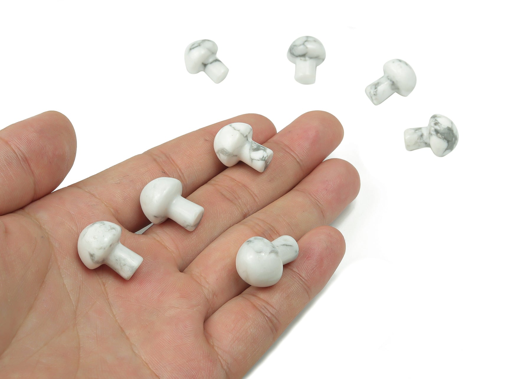 20mm Howlite mushroom carved gemstone from GemstoneGO, featuring a smooth, white and gray natural stone with detailed mushroom carving.