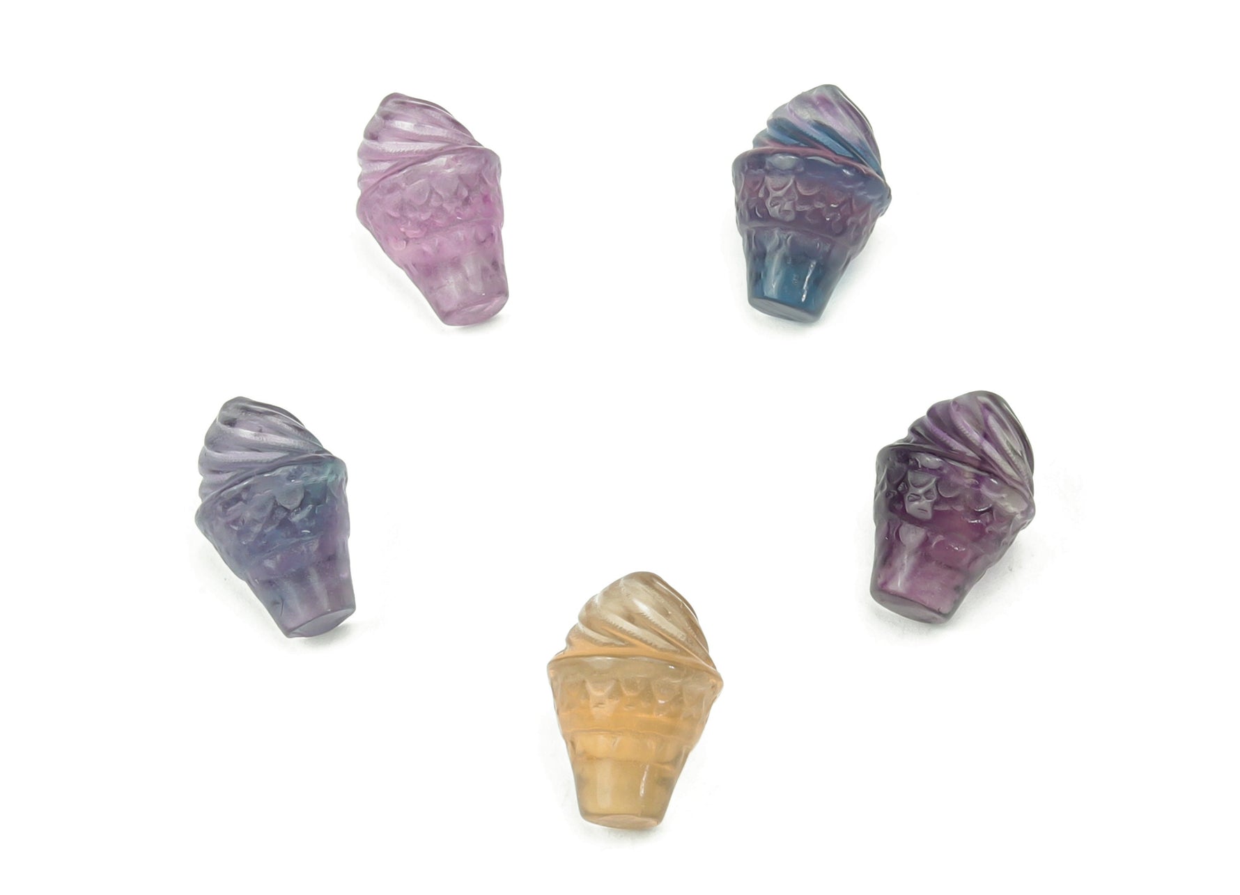 Bright fluorite ice cream carving gemstone with vibrant purple, green, and yellow hues, showcasing a polished, decorative mineral specimen.