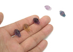 Fluorite ice cream carving gemstone by GemstoneGO, showcasing vibrant purple and green hues in a detailed ice cream shape.