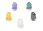 Fluorite Darth Wader carving gemstone from GemstoneGO, featuring detailed Star Wars character design in vibrant purple-green hues.
