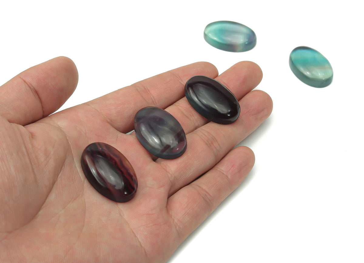 Flat fluorite gemstone slab with vibrant purple and green hues from GemstoneGO, showcasing its smooth, polished surface.