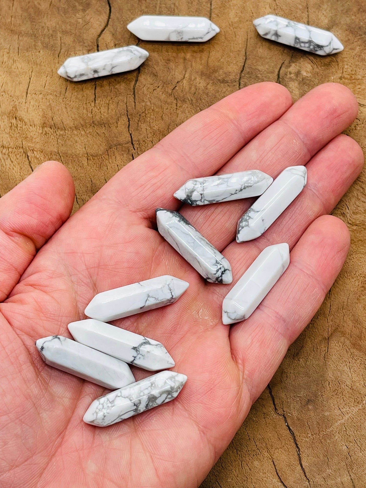 Howlite terminated carved point gemstone, 33mm, from GemstoneGO, featuring smooth white stone with natural gray veining.