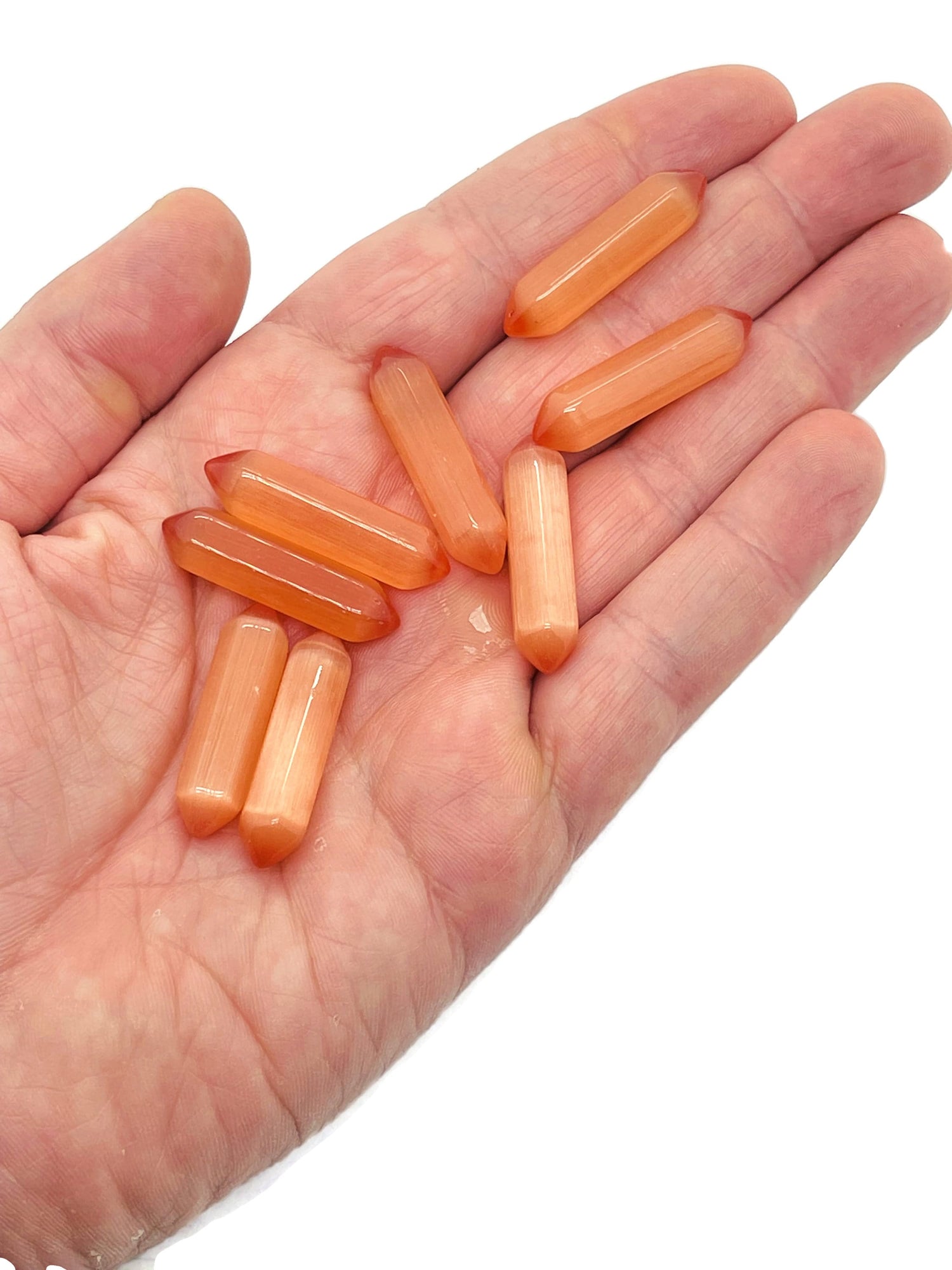Orange Cats Eye gemstone carved point, 33mm, featuring vibrant orange color and cat's eye effect, from GemstoneGO.