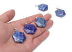 Lapis Lazuli star-shaped Merkaba pendant from GemstoneGO, used for jewelry making, with deep blue and gold speckled gemstone.