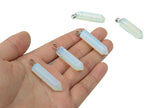 Opalite point crystal pendant from GemstoneGO, ideal for jewelry making, showcasing a smooth, translucent gemstone with a pointed tip.