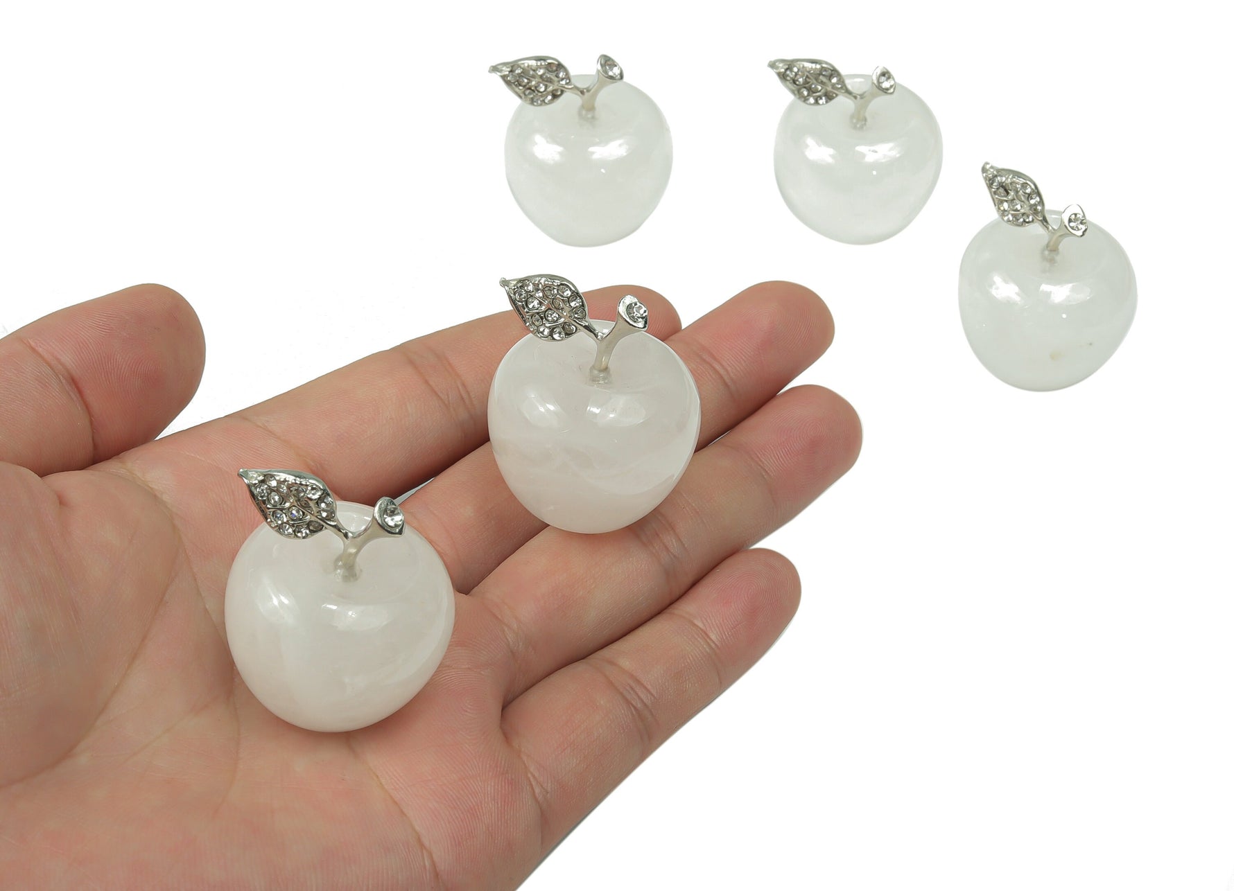 Clear Quartz Apple crystal carving from GemstoneGO, 30mm size, detailed gemstone sculpture of an apple.