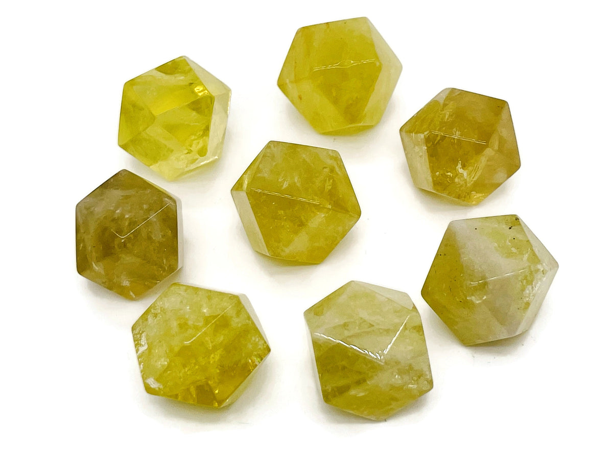 Citrine polyhedron carved gemstone, 20mm, from GemstoneGO, showing a bright yellow-orange faceted stone on a neutral background.