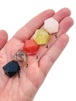 20mm polyhedron carved gemstone from GemstoneGO, a colorful mixed crystal healing stone with intricate facets.