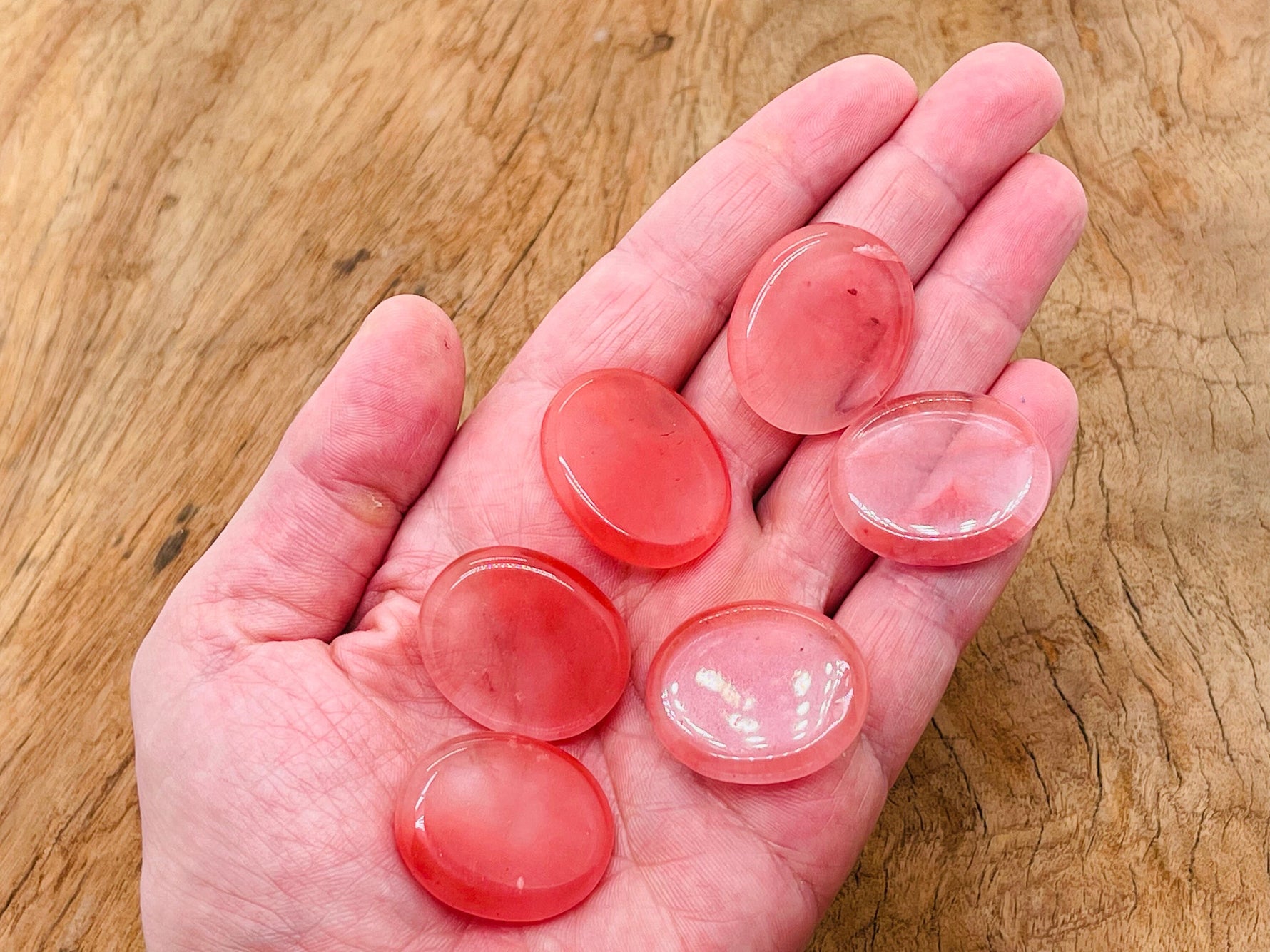 Cherry quartz flat gemstone slab showing deep red color, smooth surface, and natural crystal patterns, measuring 30x25x7 mm.