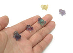 Fluorite tortoise carving gemstone from GemstoneGO, showing vibrant purple and green hues with detailed carved shell and features.