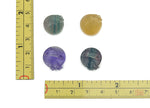 Fluorite garden basket carving gemstone from GemstoneGO showing a detailed multicolored carved stone with floral design.