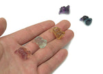 Colorful fluorite gemstone carving of a cute animal, detailed and polished, from GemstoneGO.