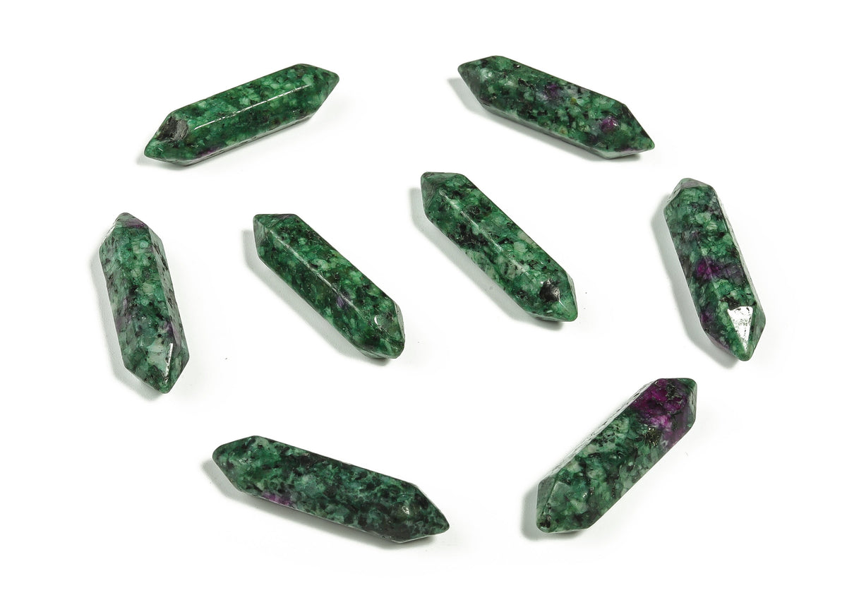 Ruby Zoisite terminated carved point gemstone from GemstoneGO, 33mm, featuring vibrant red and green mineral patterns.