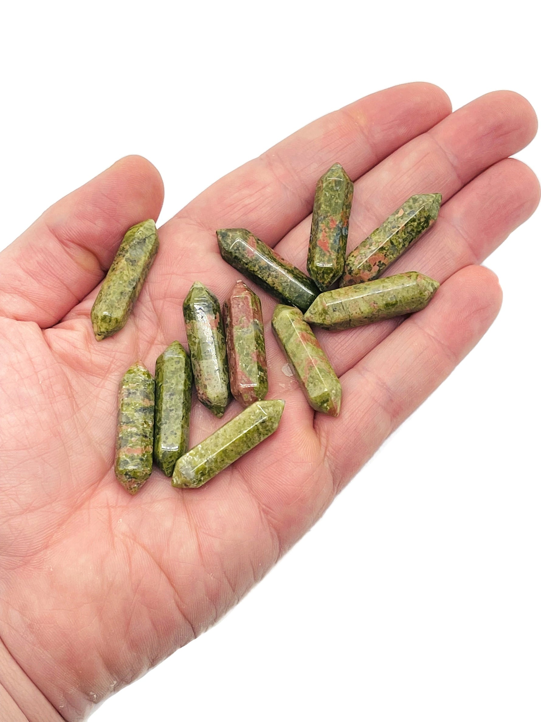 Unakite terminated carved point gemstone, 33mm length, from GemstoneGO, showing vibrant green and pink mineral patterns.