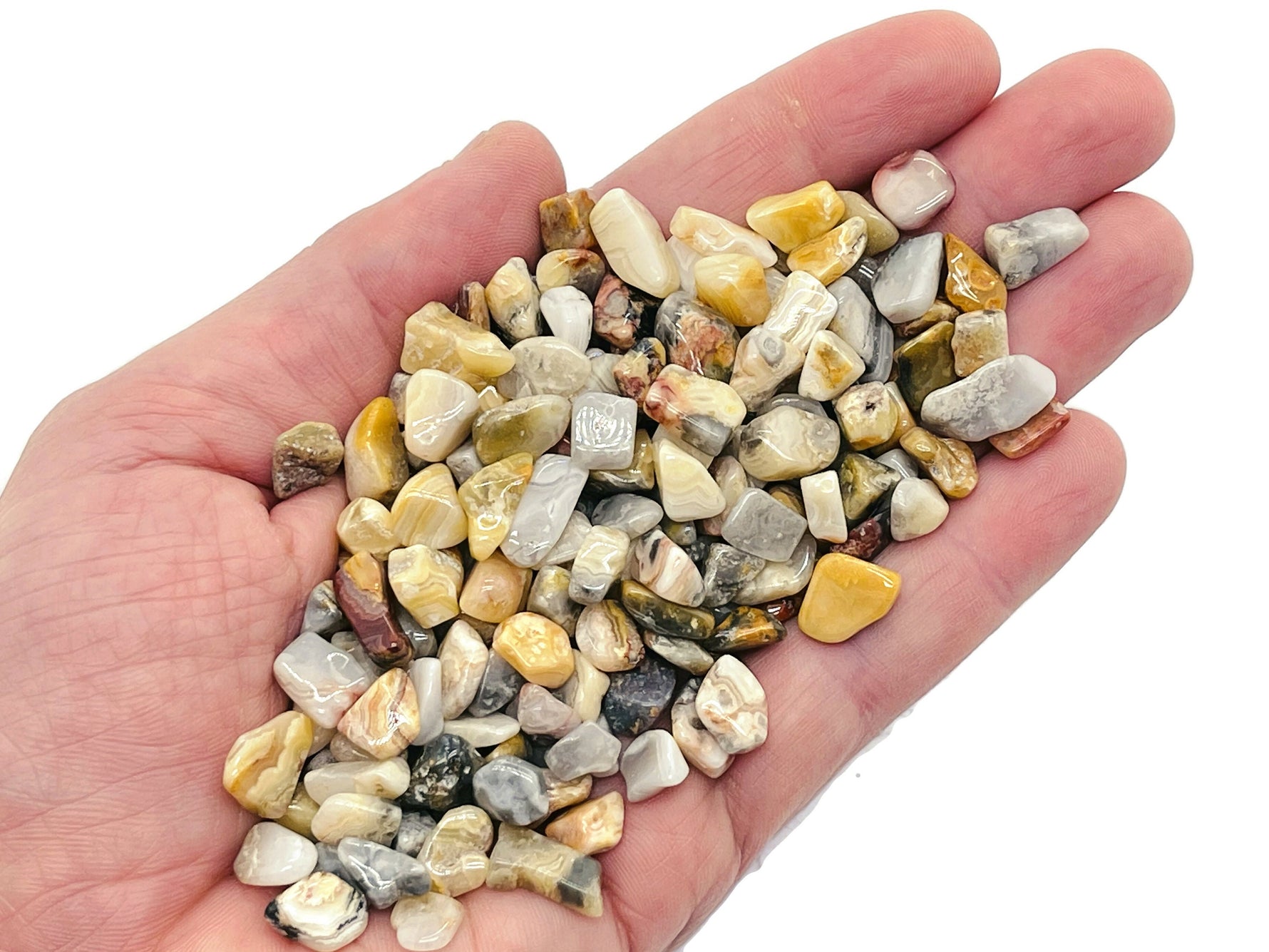 Crazy Lace Agate crystal chips from GemstoneGO, 5-7mm semi-tumbled Mexican agate stones in bulk for jewelry making and crafts.