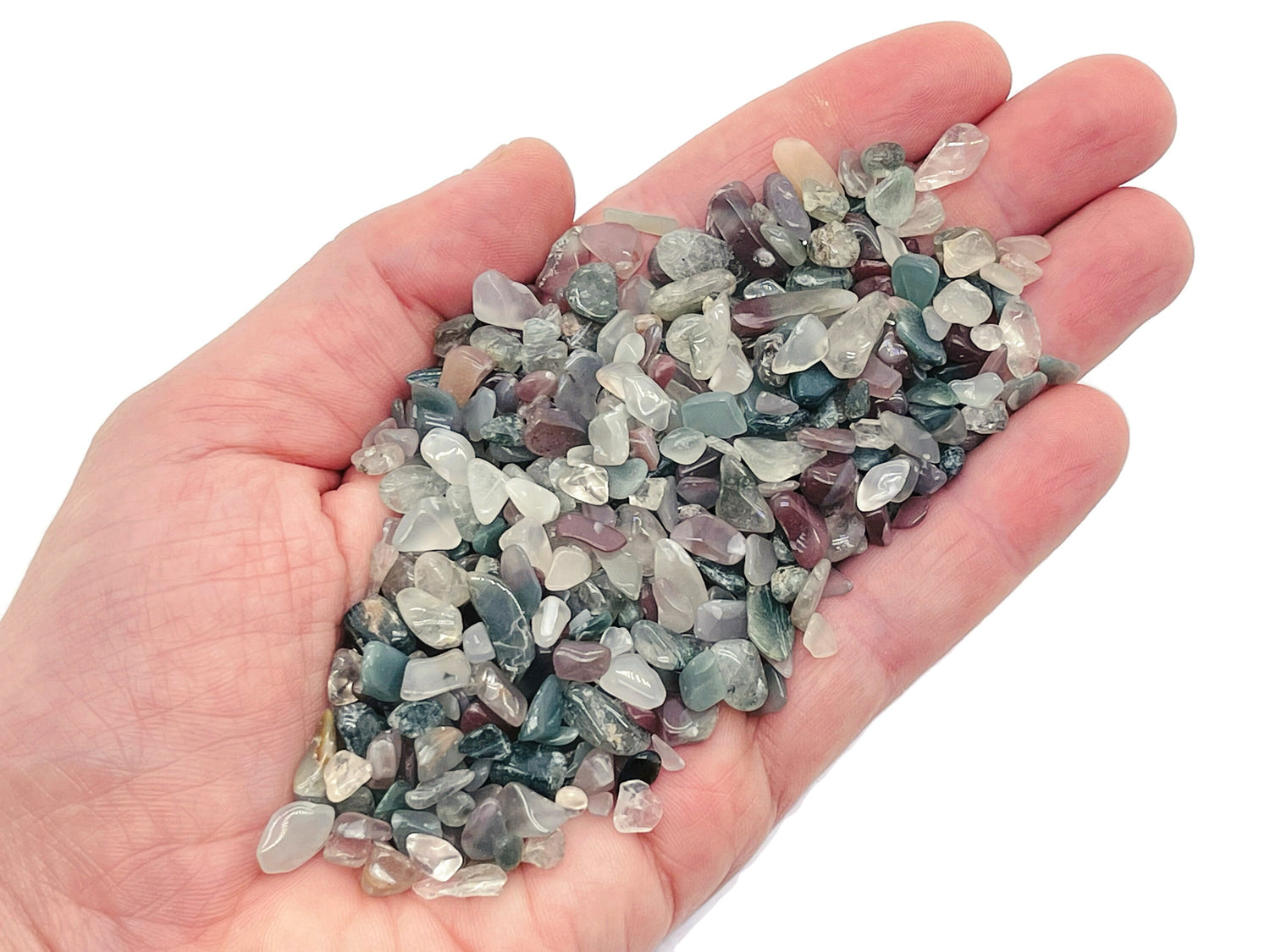 Semi tumbled Indian Agate crystal chips in 5-7mm size from GemstoneGO, displayed in a bulk collection with vibrant natural patterns.