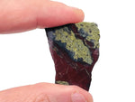 Raw Dragon Blood Jasper gemstone from GemstoneGO, showcasing deep red and brown natural stone with unique patterns.