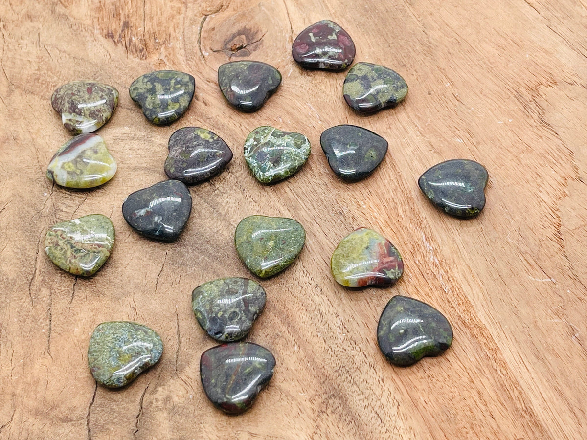Dragon Blood Jasper heart gemstone, 20x20x6mm, with rich red and black patterns, from GemstoneGO, shown on a neutral background.
