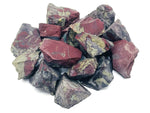 Raw Dragon Blood Jasper gemstone from GemstoneGO showing deep red and black mineral patterns in a natural unpolished form.