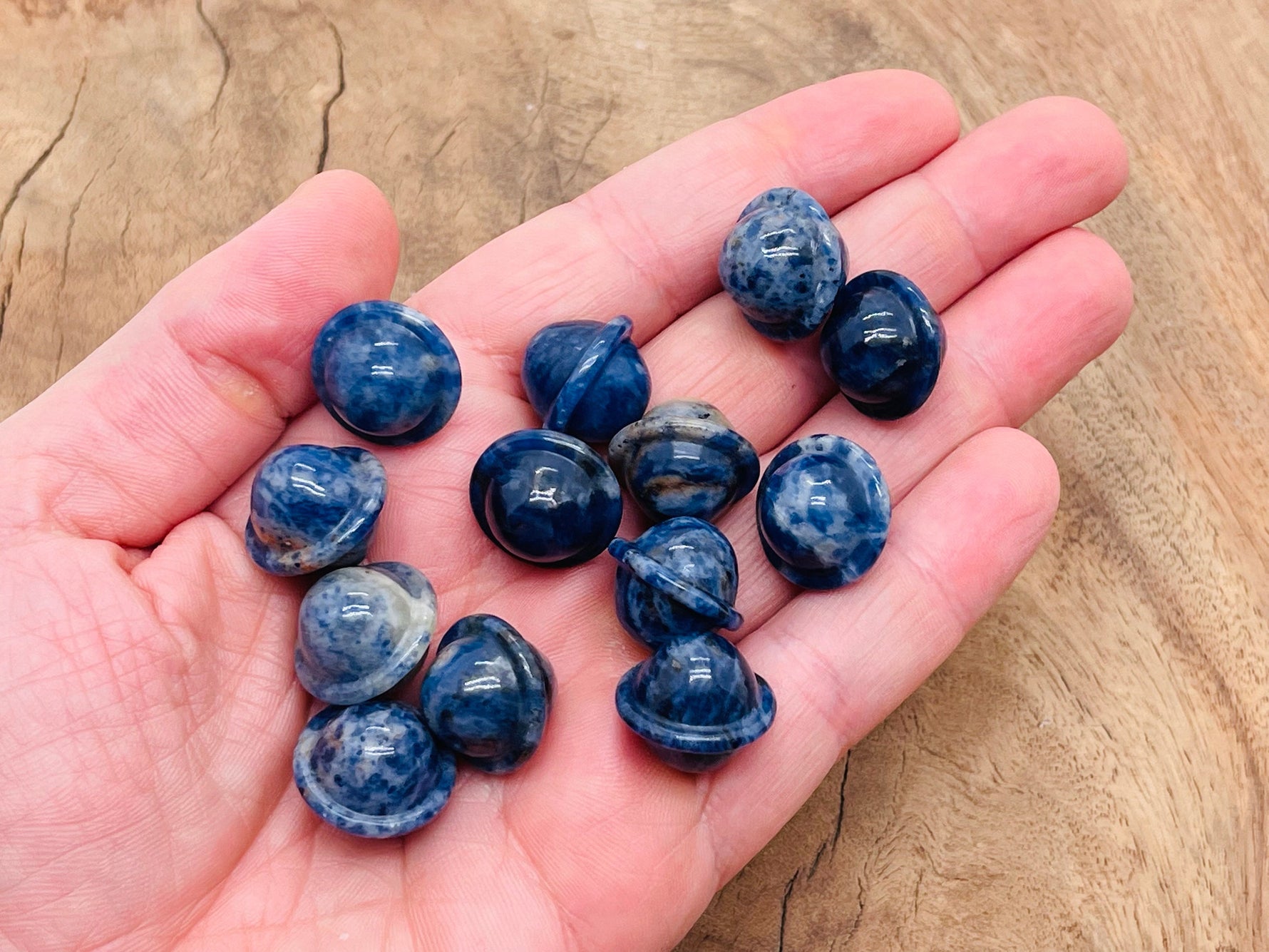 Mini Sodalite Saturn crystal carved gemstone, 18mm planetary pendant, featuring deep blue and white mineral patterns from GemstoneGO