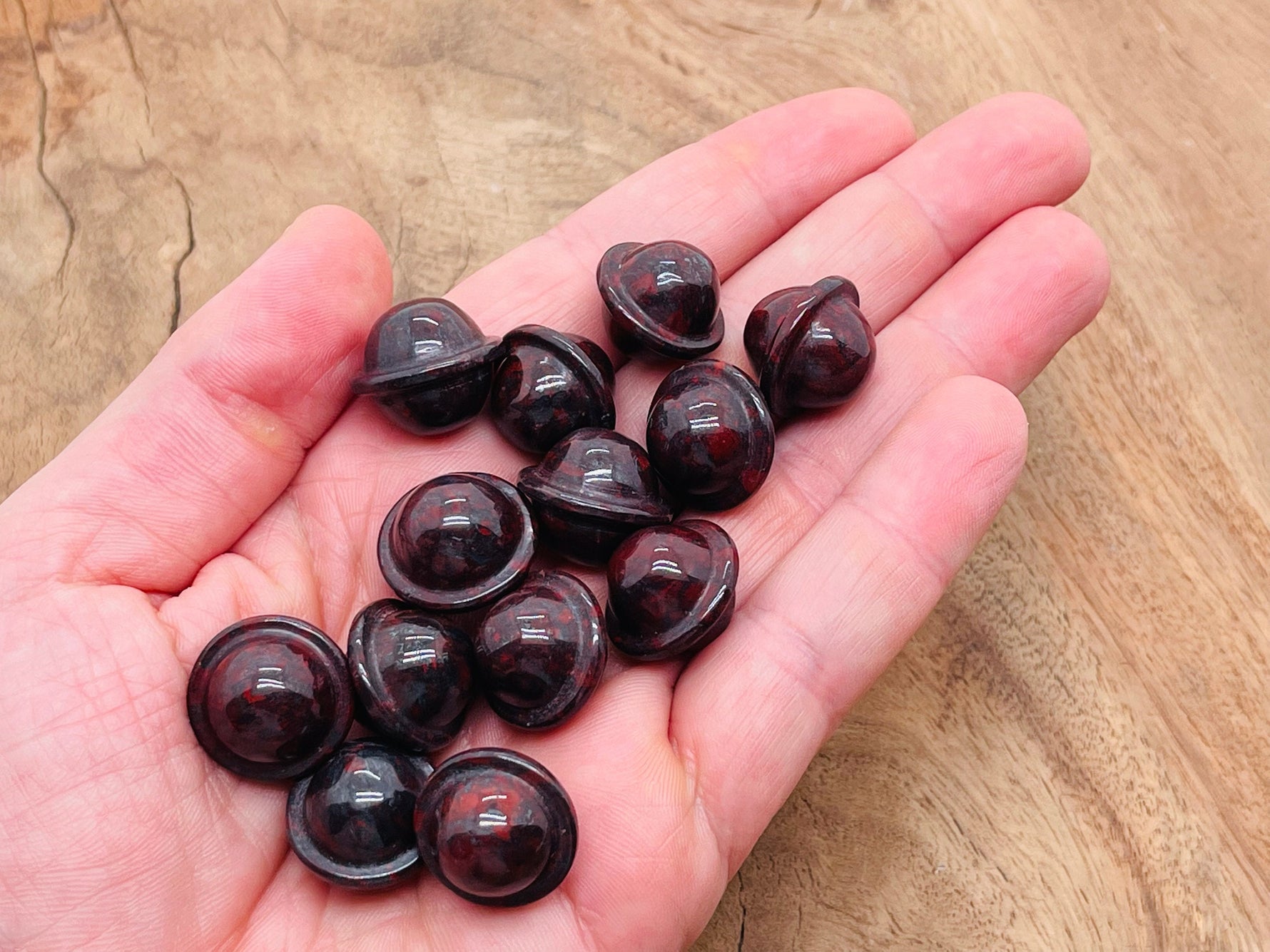 Mini 18mm Chicken Bloodstone Jasper Saturn crystal carved gemstone from GemstoneGO, featuring detailed planetary design and rich red-brown hues.