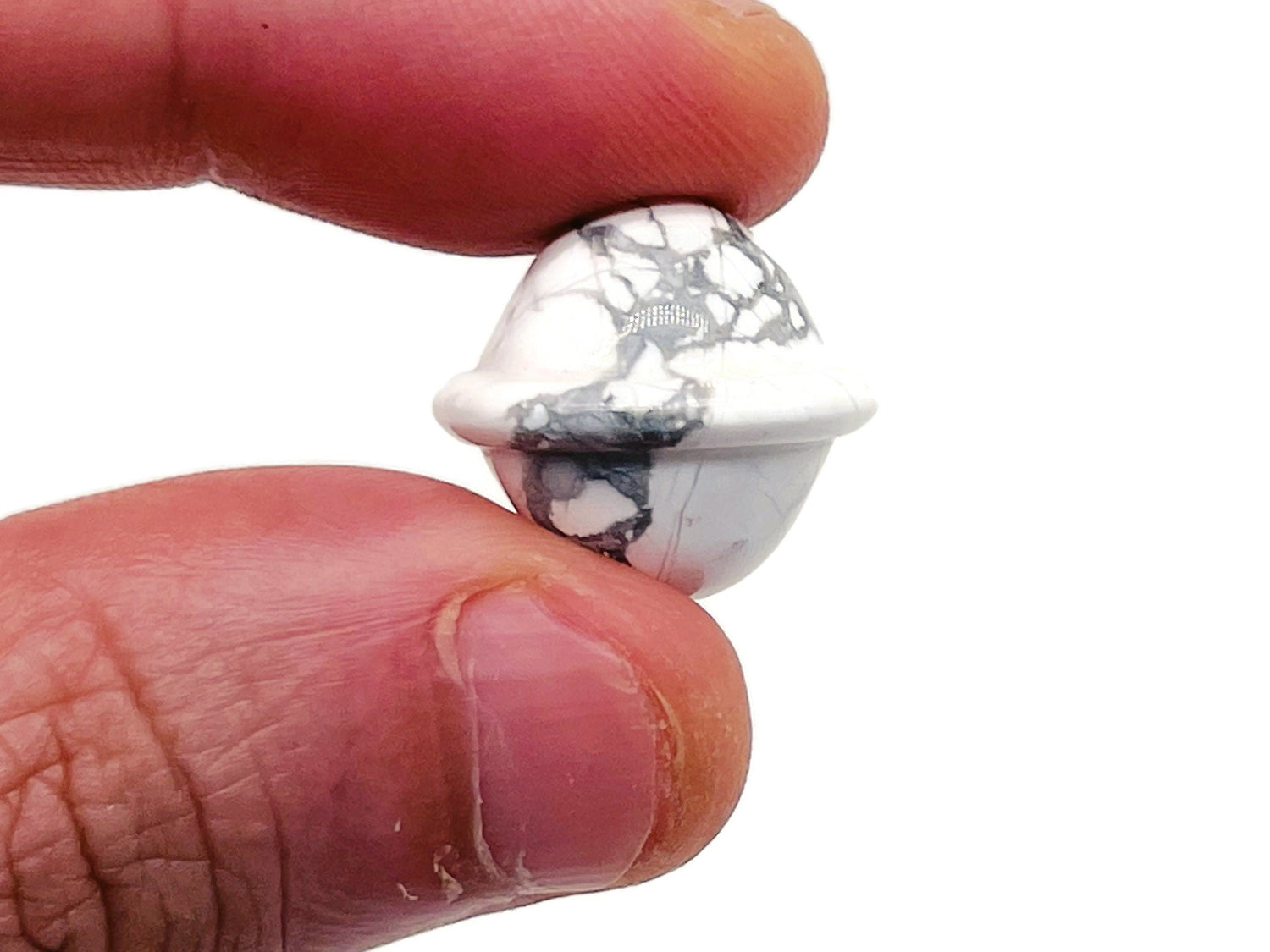 Mini 18mm Howlite Saturn crystal carved gemstone planet from GemstoneGO, featuring detailed planetary design and smooth surface.