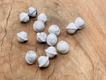 Mini 18mm Howlite Saturn crystal carved gemstone planet, showcasing detailed planetary design, from GemstoneGO.